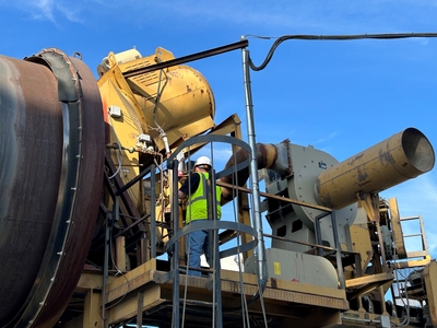 DSC Service Consultant Working on Asphalt Burner